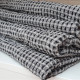 Half-linen bath towel with black and white squares